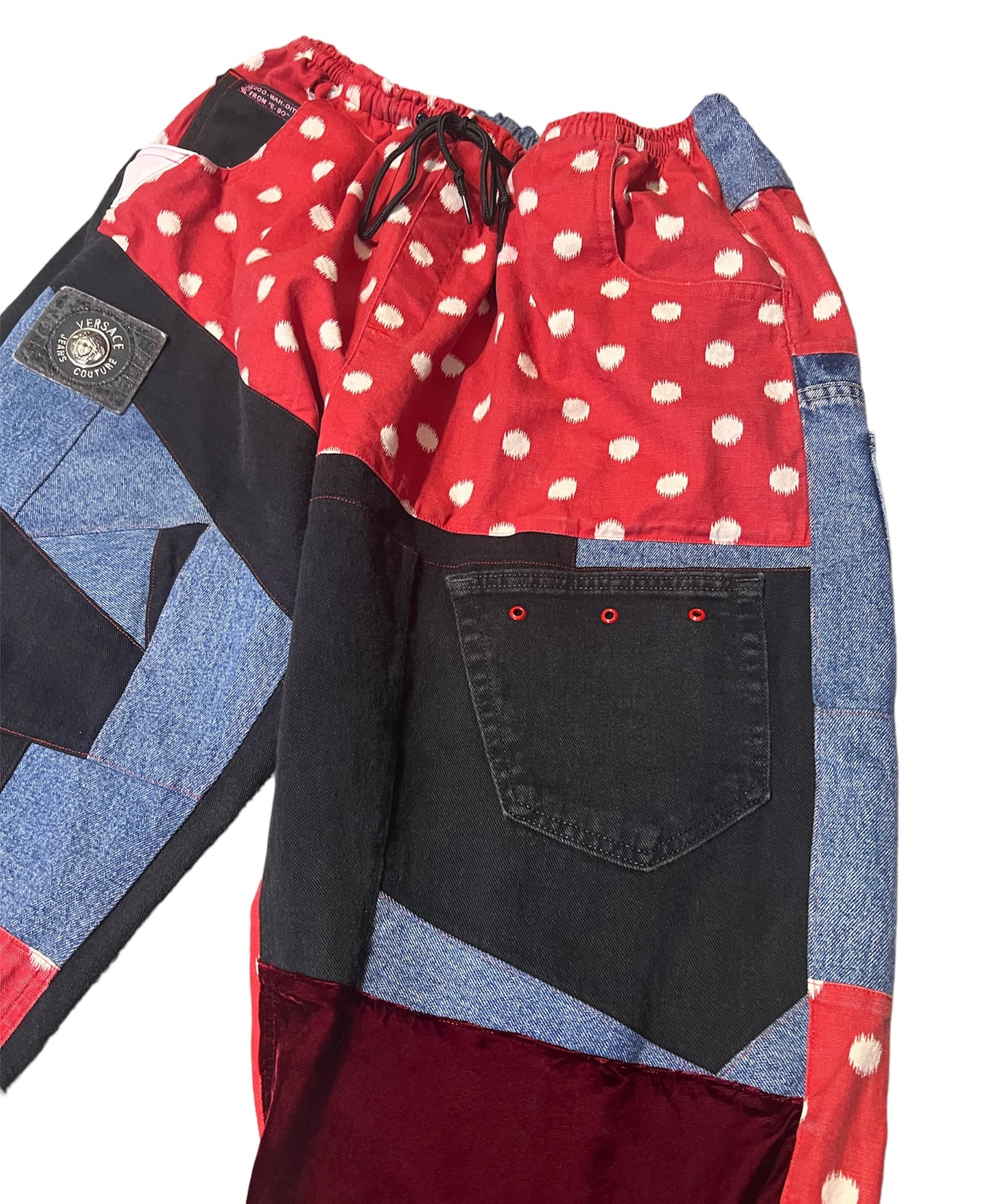 Reworked Versace and black denim with red velvet accents